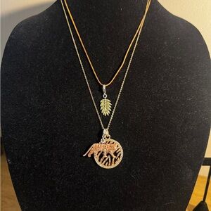 Elegant Swarovski Gold Tiger & Leaf round Pendant Necklace. Adjustable length